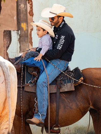 Apore, Goias, Brazil - 05 07 2023: Horseback riding event open to the public on public roads in the Brazilian city of Aporeのeditorial素材
