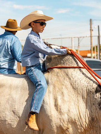 Apore, Goias, Brazil - 05 07 2023: Horseback riding event open to the public on public roads in the Brazilian city of Aporeのeditorial素材