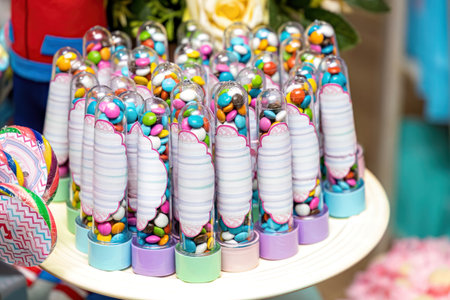 birthday party favor multi colored button shaped chocolatesの写真素材