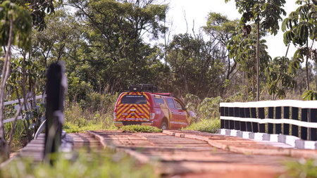 Mineiros, Goias, Brazil - 11 25 2023: close up of firefighter vehicle passing point over the Formoso...