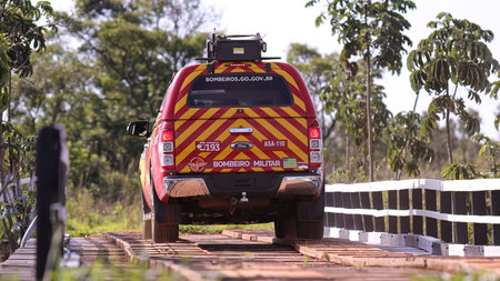 Mineiros, Goias, Brazil - 11 25 2023: close up of firefighter vehicle passing point over the Formoso...