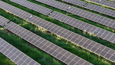 aerial image of solar energy plant in rural area