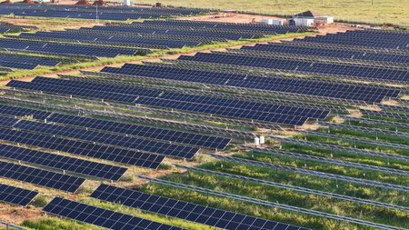 aerial image of solar energy plant in rural area
