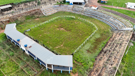 Itaja, Goias, Brazil - 04 13 2024: aerial image of abandoned itaja rural union rodeo arena with grassのeditorial素材