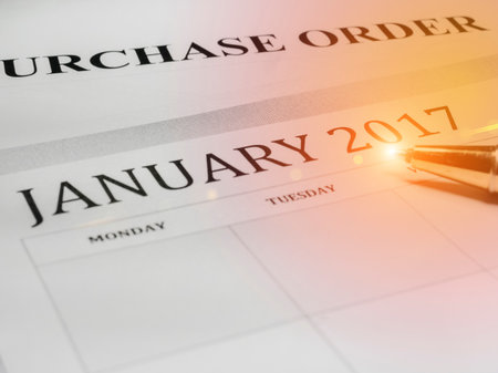 A pen on business paperの写真素材