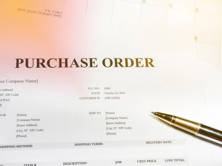 A pen on business paperの写真素材