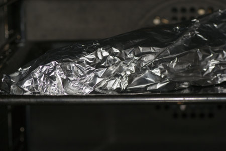 foil prepared fish food drink grilled cooking seafoodの写真素材