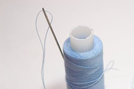 thread sewing needle close-up objects equipment work