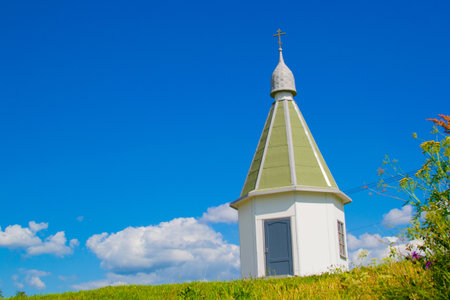 chapel on the hill in the village in summerの写真素材
