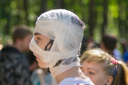 Saint Petersburg, Russia - August 15, 2015: people dressed as zombies parade on the street while walking in St. Petersburg zombie, the zombie walk is part of the event a flash mob.のeditorial素材