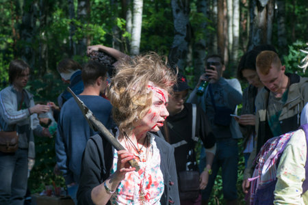 Saint Petersburg, Russia - August 15, 2015: people dressed as zombies parade on the street while walking in St. Petersburg zombie, the zombie walk is part of the event a flash mob.のeditorial素材