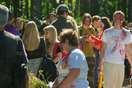Saint Petersburg, Russia - August 15, 2015: people dressed as zombies parade on the street while walking in St. Petersburg zombie, the zombie walk is part of the event a flash mob.のeditorial素材