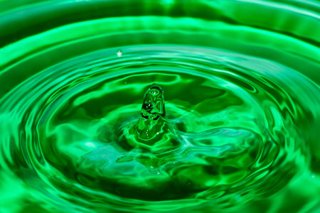 surface liquid drop blue splashing ripple water drinkの写真素材