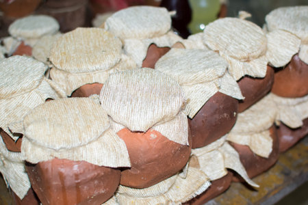 a clay pot of honey trade in the villageの写真素材