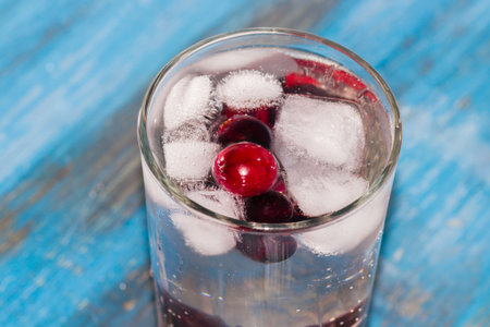 frozen berries closeup on wooden background vitaminの写真素材