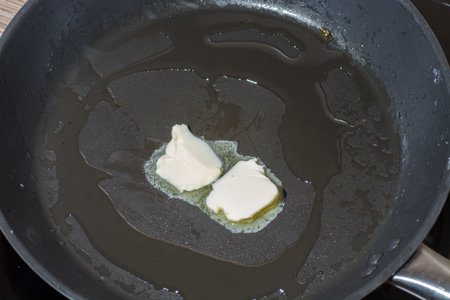 fried eggs with fresh eggs and delicious homeの写真素材