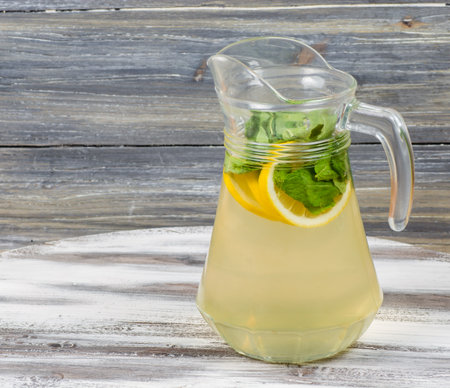 a cold refreshing drink on a wooden backgroundの写真素材