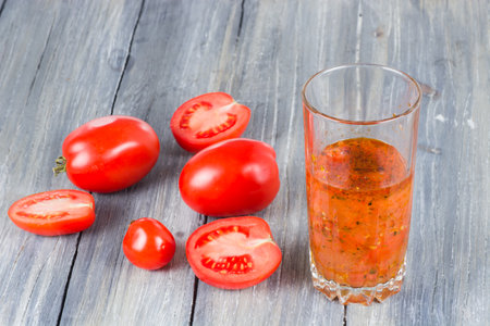 tomatoes on woodenの写真素材