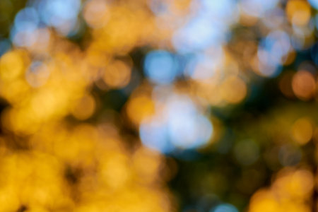 yellow bokeh on a light background blurred colorful autumn