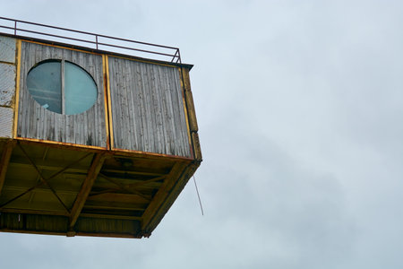 bitonic old and slightly dilapidated building overlooking the streetの写真素材
