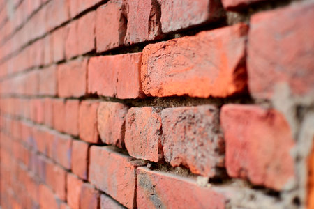 brick wall of old red color shotの写真素材