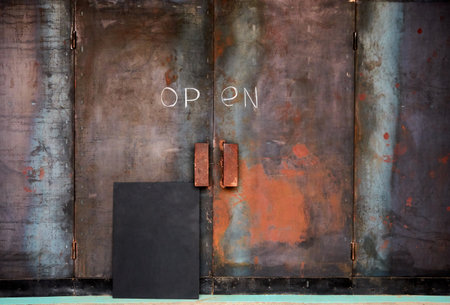 iron door from the institution to enter open or closedの写真素材