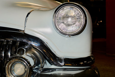 headlights of an old vintage car close-upの写真素材