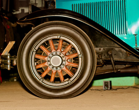 wheel of an old vintage car close-upの写真素材