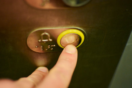 pressing the button in the Elevator with your finger next to the danger