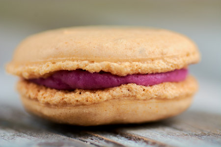 cooking homemade macarons at home with your hands on a white backgroundの写真素材