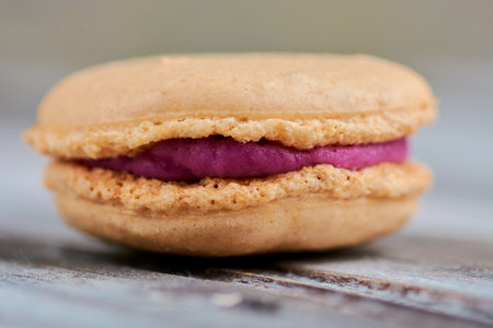 cooking homemade macarons at home with your hands on a white backgroundの写真素材