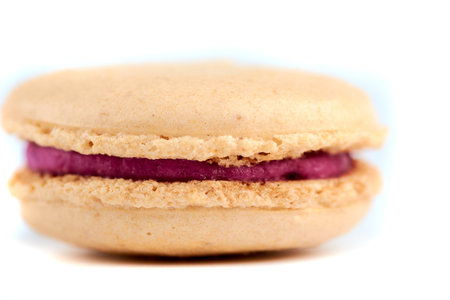 cooking homemade macarons at home with your hands on a white backgroundの写真素材