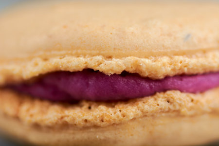 cooking homemade macarons at home with your hands on a white backgroundの写真素材