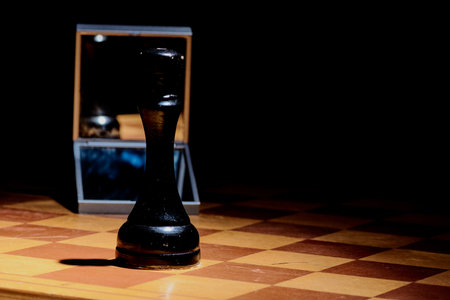 Black and White King and Knight of chess setup on dark background . Leader and teamwork concept for success. Chess concept save the king and save the strategyの写真素材
