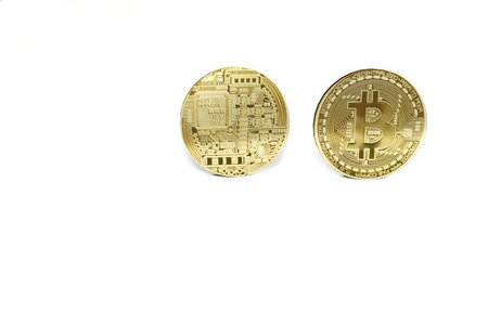 bitcoin coin on black background with reflective surface 3D renderingの写真素材