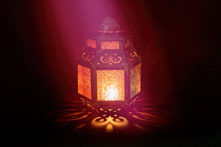 Traditional Arabic lantern lit up for celebrating the Holy Month of Ramadan