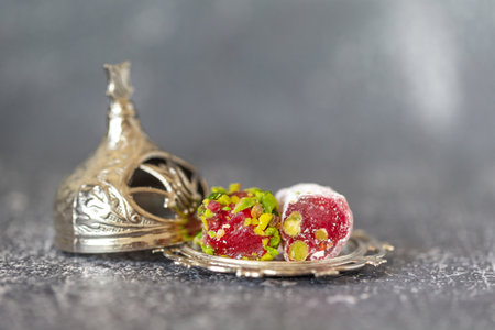 Delicious Turkish dessert called rahat locum on a small silver plateの写真素材