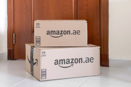 Abu Dhabi, UAE - May 16, 2023: Amazon packages with goods delivered to the doorのeditorial素材