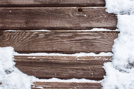 Snow on the wood backround.の写真素材