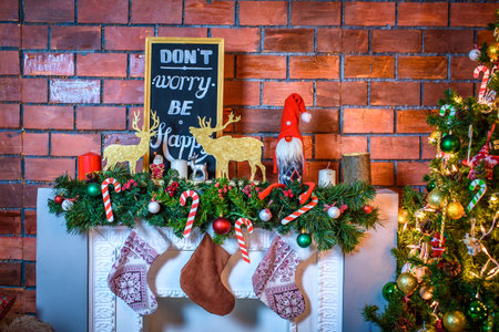 Beautiful Christmas interior. Brick new year decorations.の写真素材