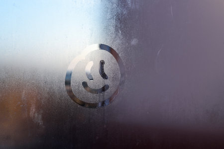 The inscription smile on the sweaty glassの写真素材