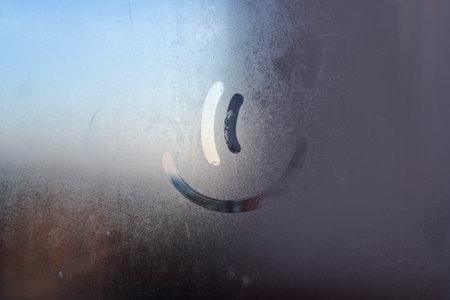 The inscription smile on the sweaty glassの写真素材