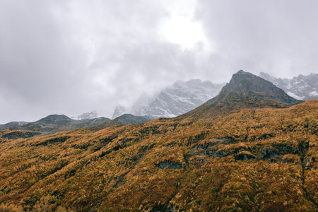 Mountain landscape with road of golden autumn. Caucasus Mountains, Dombay.の写真素材
