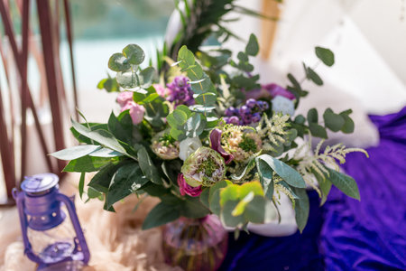 Delicate wedding decorations for the morning of the bride on the mountain lakes.の写真素材
