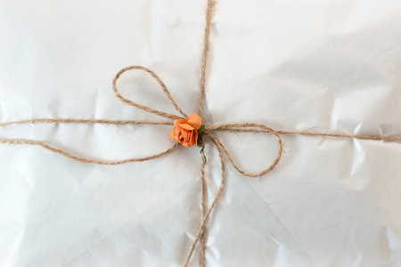 white paper package tied with string.の写真素材