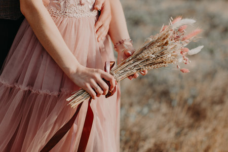 bouquet in the hands of the brideの写真素材