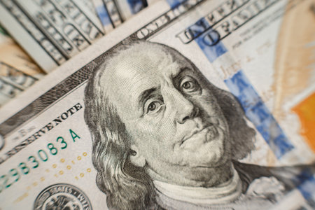 Macro close up of Ben Franklins face on the US one hundred dollar billの写真素材