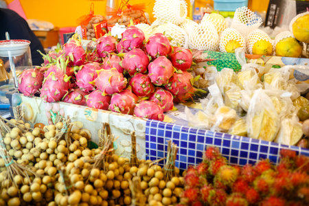 Traditional asian food market in Thailand, exotic fruits.