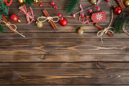Brown wooden background with festive Christmas decoration, copy space.の写真素材