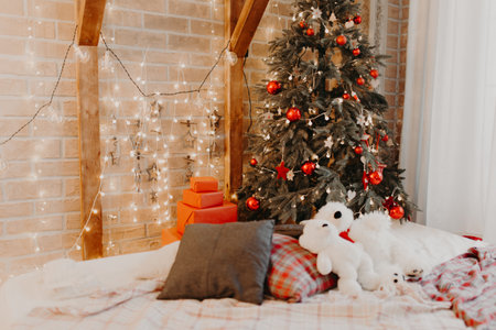 Christmas composition. Gift, fir tree branches and christmas tree balls on white wood background. Winter, new year concept.の写真素材